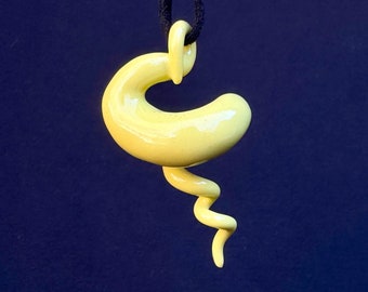 handmade porcelain squiggle pendant in glossy yellow