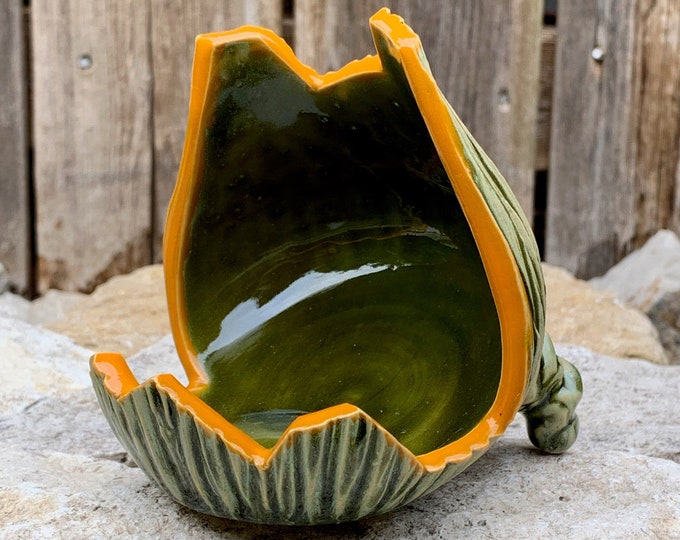 ceramic spoon and spatula rest in green and orange