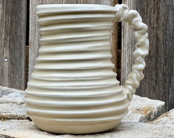 handmade whimsical porcelain mug in white