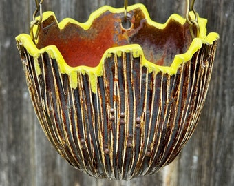 porcelain hanging pot in red, gray, and yellow