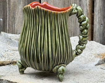 handmade whimsical porcelain mug in green and plum