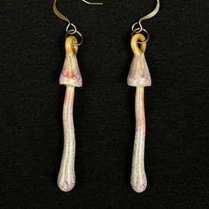 handmade porcelain psilocybin earrings glazed in sage gray purple and pink glazes, antique bronze plated brass findings