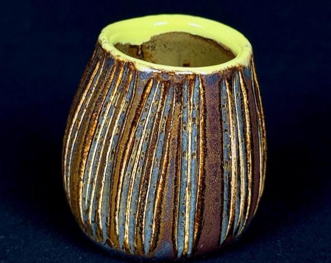 handmade porcelain shot glass in red, gray, and yellow