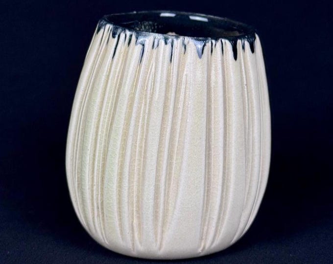 handmade porcelain cup in white and black