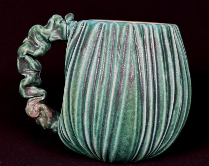 handmade whimsical porcelain mug in turquoise and violet
