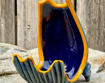 porcelain spoon and ladle rest in blue and orange