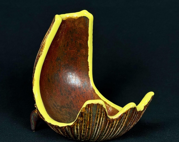 handmade porcelain spoon and ladle rest in red, gray, and yellow