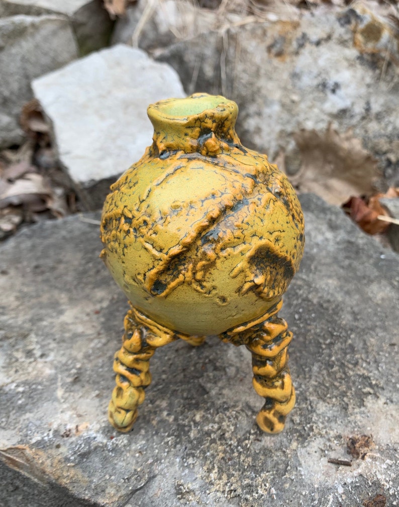 melon green and black small ceramic bud vase in golden yellow