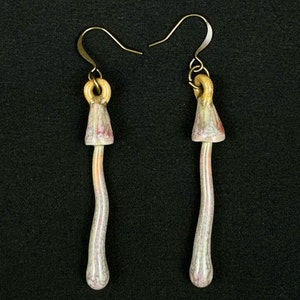 handmade porcelain psilocybin earrings glazed in sage gray purple and pink glazes, antique bronze plated brass findings