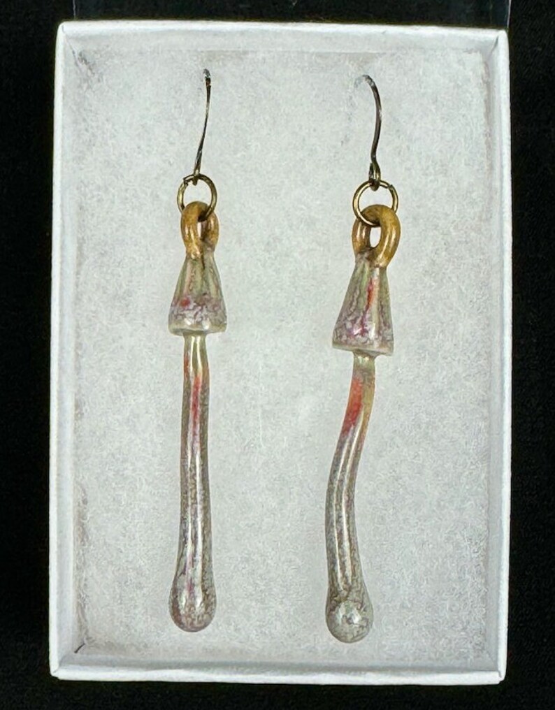 handmade porcelain psilocybin earrings glazed in sage gray purple and pink glazes, antique bronze plated brass findings