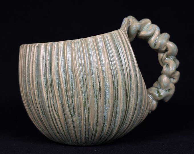 handmade whimsical porcelain mug in green and violet