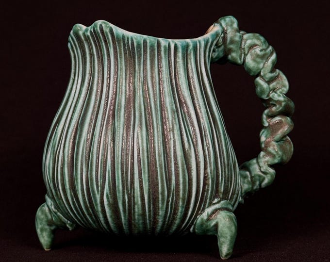handmade whimsical porcelain mug in turquoise and violet