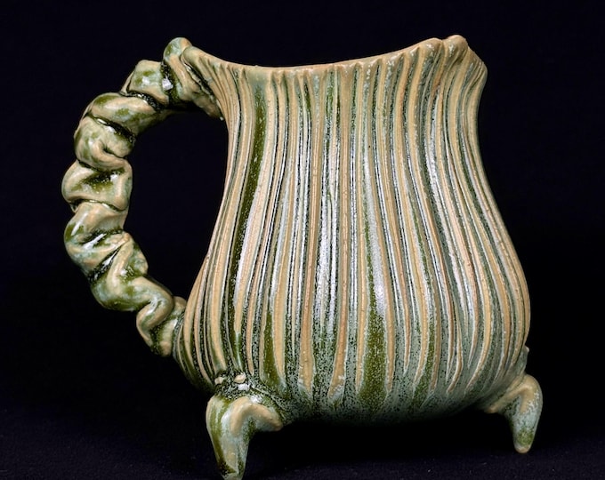 handmade whimsical porcelain mug in green and magenta