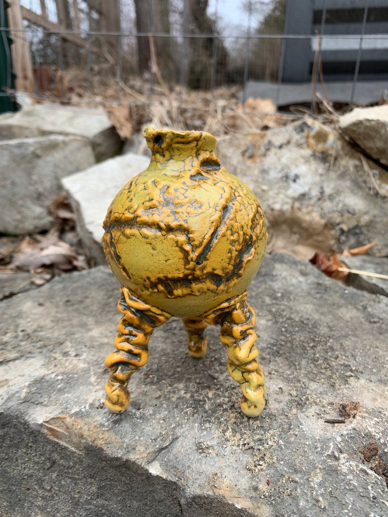 melon green and black small ceramic bud vase in golden yellow