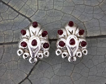 Vintage Remy Dis Paris Clip On Earrings: Silver Tone Metal & Small Red Stones