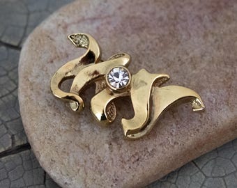 Vintage Gold Tone Metal Ribbon Brooch with a Rhinestone: Elegant 1980s Style Pre Owned Jewelry