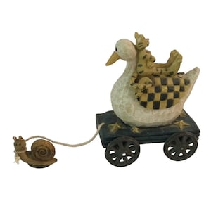 Boyds „Carvers Choice”, Wilma Quacksworth z figurką Felixa Riding High Pull