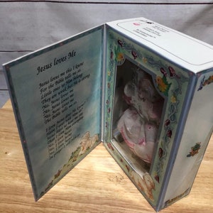 Muñeca de porcelana fina de Marie Osmond Una canción infantil