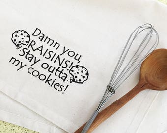 Damn you raisins stay outta my cookies organic kitchen dish towel. Silk screened cotton tea towel.