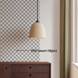 May include: A beige, ribbed pendant light hangs from a black cord. The light is suspended above a dark brown wooden cabinet. The text "PSD Smart Object" is below the light fixture.