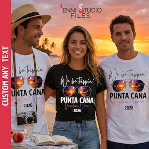 May include: Three people wearing t-shirts with the text "We be Trippin'" and "Punta Cana Vacation Squad 2026". The shirts feature sunglasses with a sunset scene. One person wears a straw hat. The background shows a beach at sunset.