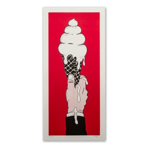 May include: A hand in a suit holds a melting ice cream cone with white ice cream and a black and white waffle cone against a red background.