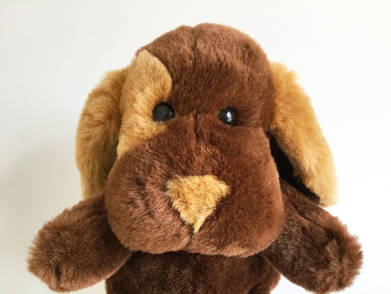 puppy with stuffed animal