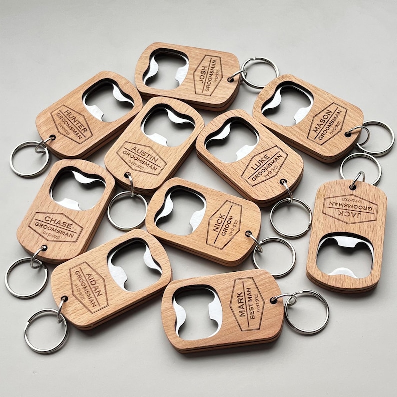 Ten wooden bottle opener keychains