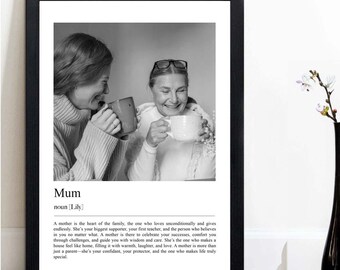 May include: Black and white photo of two women holding mugs, with a definition of the word "Mum" below the photo. The definition reads: "A mother is the heart of the family, the one who loves unconditionally and gives endlessly. She's your biggest supporter, your first teacher, and the person who believes in you no matter what. A mother is there to celebrate your successes, comfort you through challenges, and guide you with wisdom and care. She's the one who makes a house feel like home, filling it with warmth, laughter, and love. A mother is more than just a parent-she's your confidant, your protector, and the one who makes life truly special."