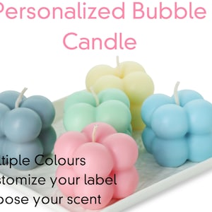 May include: Five colourful bubble candles on a white surface. The candles are in various colours, including blue, green, pink, and yellow. The text "Personalized Bubble Candle" is at the top of the image. Below the candles, the text reads "Multiple Colours", "Customize your label", and "Choose your scent".