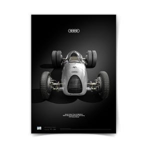 May include: A silver vintage race car poster with the Audi logo at the top. The car is centered, with four large tires visible. Text at the bottom reads "Auto Union Type C Hillclimb 1937 Schauinsland GP Germany #11 Hans Stuck."