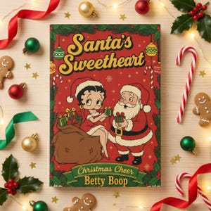 May include: A festive book cover titled "Santa's Sweetheart" featuring Betty Boop and Santa Claus in Christmas attire. The cover is red with green and gold accents, surrounded by holiday decorations like ornaments, ribbons, and gingerbread men.