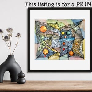 Puede incluir: Pintura abstracta de acuarela con un diseño en forma de telaraña y círculos coloridos. La pintura está enmarcada en negro.