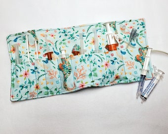 Seahorse Syringe Holster with plain tan interior lets you tote prefilled oral or enfit syringes on the go! Ready to Ship.