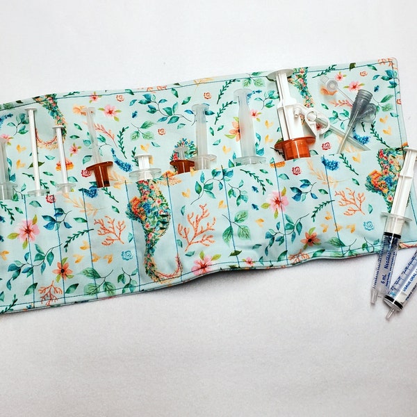 Seahorse Syringe Holster with plain tan interior lets you tote prefilled oral or enfit syringes on the go! Ready to Ship.