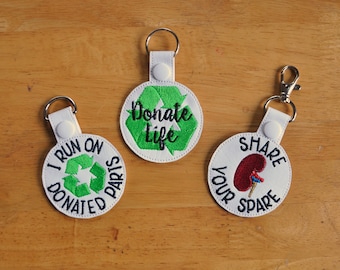 Organ Donation, Organ Transplant Keychain, Key Fob. Donated Parts, Donate Life, Share Your Spare. Organ and tissue donation. Your Choice.