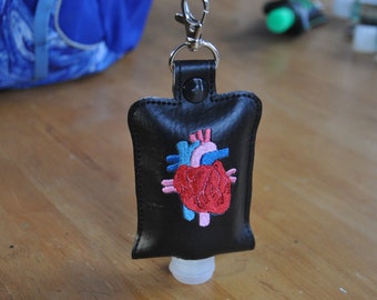 Anatomical Heart Keychain Hand Sanitizer Holder. Perfect gift for cardiologists, cardiology nurses, heart transplant & heart defect patients