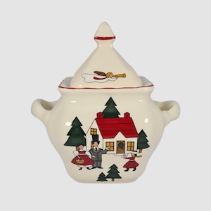 May include: White ceramic sugar bowl with a red roofed house and Christmas trees design. The lid features an angel with a trumpet.