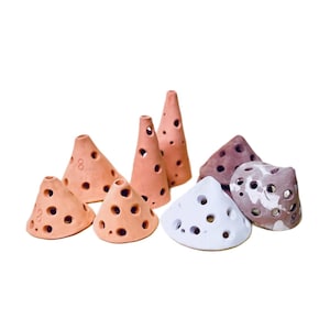 May include: A distressed wooden sign, reading "Welcome to our home" in white lettering. The sign has a rustic finish, ideal for adding a welcoming touch to any home's entrance.