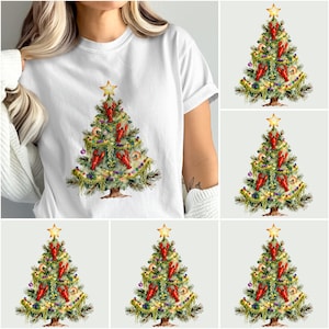May include: White t-shirt featuring a watercolor Christmas tree design. The tree is decorated with red crawfish, purple ornaments, gold fleur-de-lis, and a gold star on top. The tree is adorned with green garland and purple and gold beads.