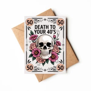 May include: A greeting card with a skull and floral design, the text reads "DEATH TO YOUR 40'S". The card has pink and peach flowers and the number "50" in circles. The card is on a brown envelope.