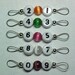 Cats Eye Dual Numbered Stitch Markers - US 5 - Item No. 659