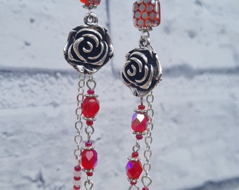 STRIKING and STYLISH long drop unique style earrings with Silver coloured ROSE and red glass beads