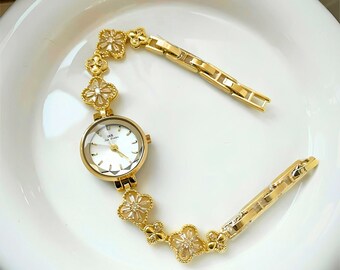 montre en or vintage, montre délicate, montre femme vintage, montre en or délicate, montre en or pour femme, montre pour femme, montre en or, montre, cadeau pour elle