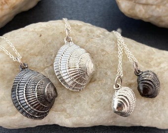 Simple silver shell pendants