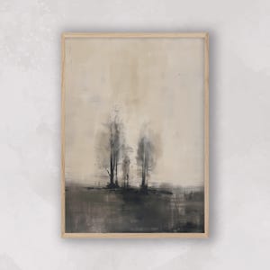 May include: A framed abstract painting with a muted beige background and three dark silhouettes of trees in the center. The trees are painted in a minimalist style with a soft, hazy effect.