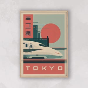 May include: A framed art print featuring a stylized illustration of a high-speed train in Tokyo. The artwork includes a red sun, the word "TOKYO" in red block letters, and Japanese text. The train is white and gray.