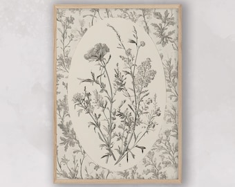 May include: A black and white botanical illustration of a cluster of wildflowers with delicate stems and leaves. The illustration is framed in a light wood frame and has a cream background.
