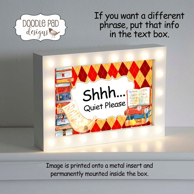 May include: A white light-up sign with a red and yellow checkered background. The sign says "Shhh... Quiet Please" and features a stack of books with a scroll.