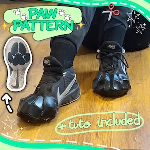 May include: Black Nike trainers with a silver swoosh logo, modified with a paw-shaped design on the toe. The image includes the text "PAW PATTERN" and "+ tuto included". A paw print template is also shown.